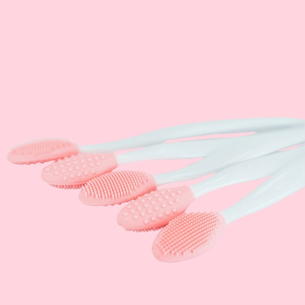 Peeling & Massage Bürste aus Silikon mit zwei Seiten - rosa